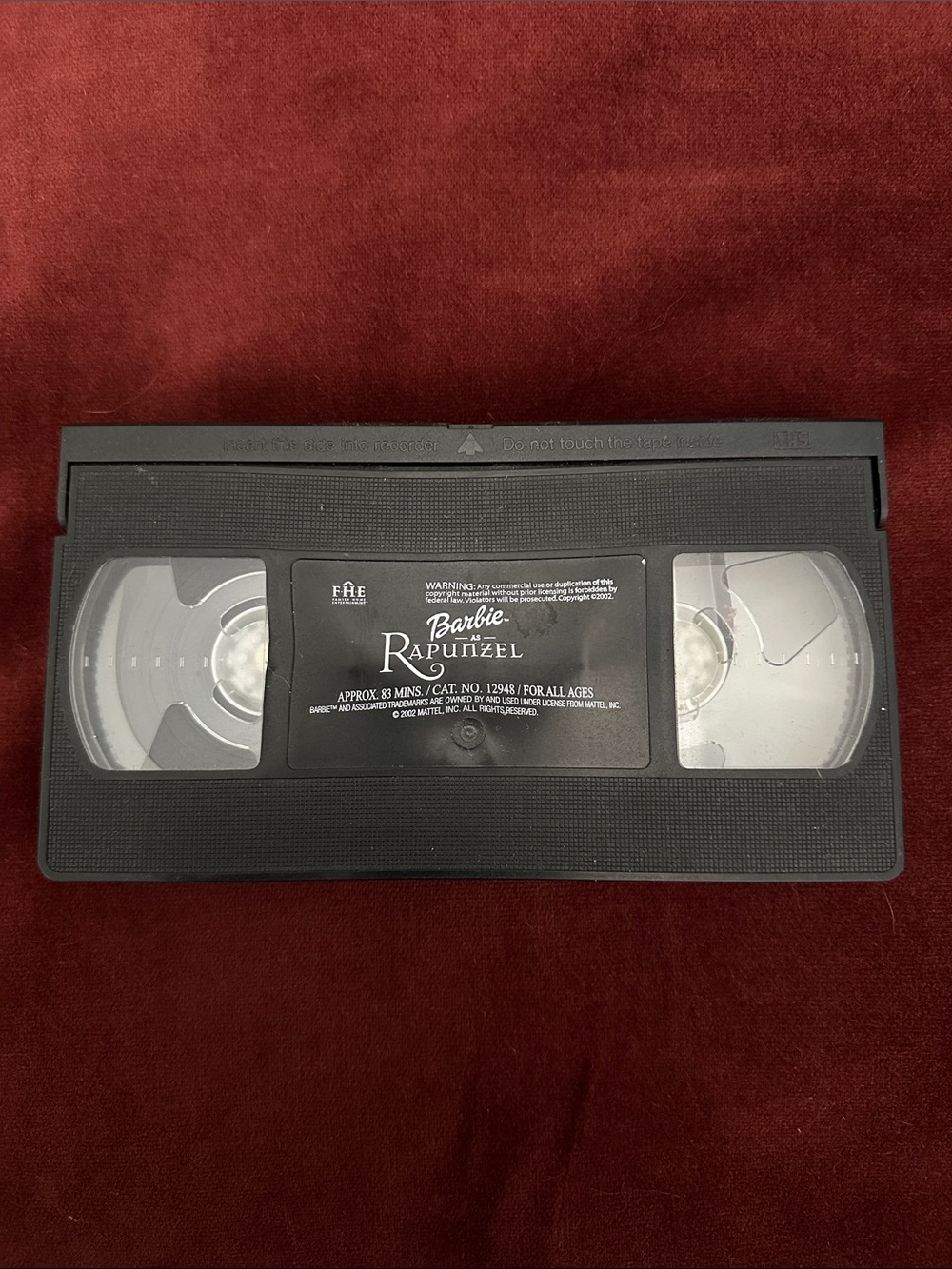 Barbie Rapunzel VHS Tape - Black with Clear Windows.